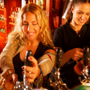 2 women pouring beers